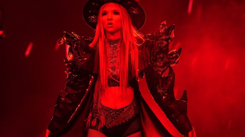 Julia Hart bathed in red light during her entrance on "AEW Dynamite."