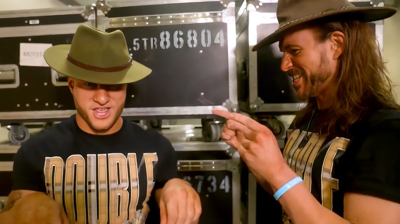 MJF and Adam Cole wearing hats