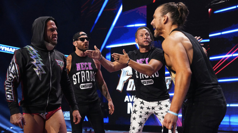 Adam Cole, The Kingdom and Roderick Strong arguing