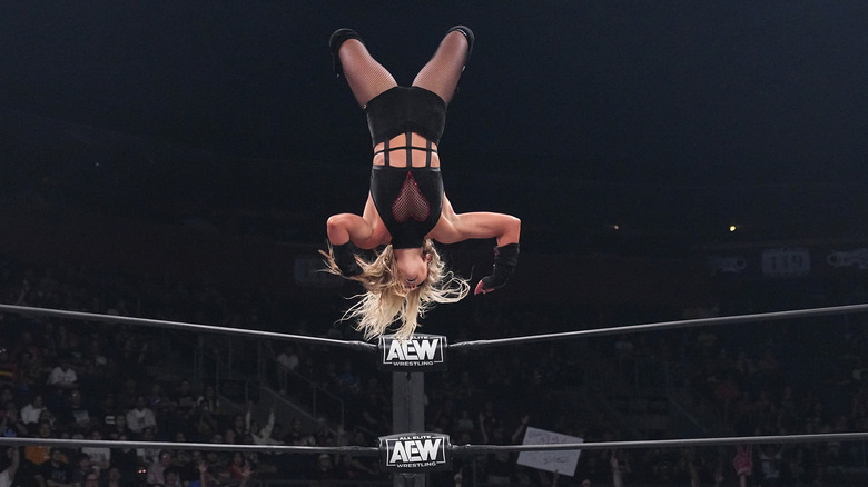 Julia Hart in the middle of a moonsault
