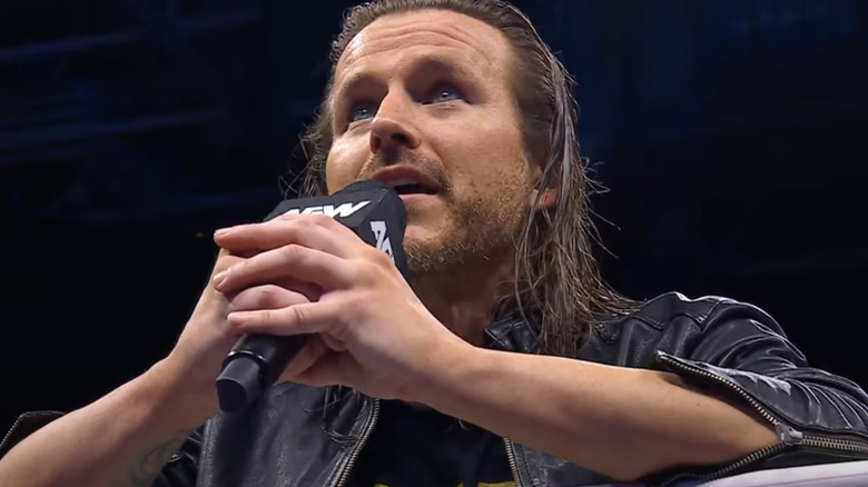 Adam Cole with microphone