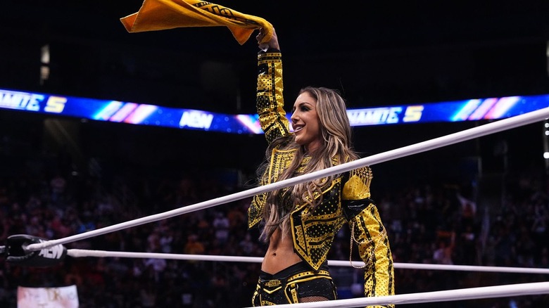 Britt Baker waving a terrible towel