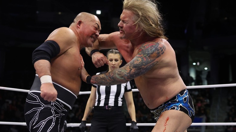 Chris Jericho hitting Tomohiro Ishii with a forearm in the ring on "AEW Dynamite."