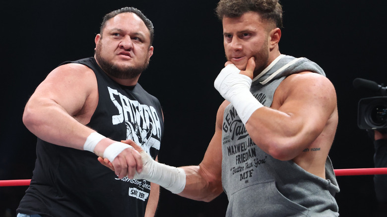 Samoa Joe and MJF shaking hands