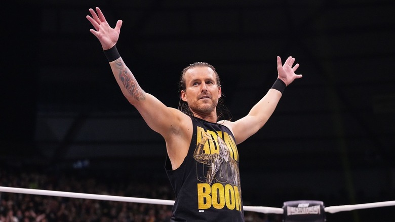 Adam Cole poses