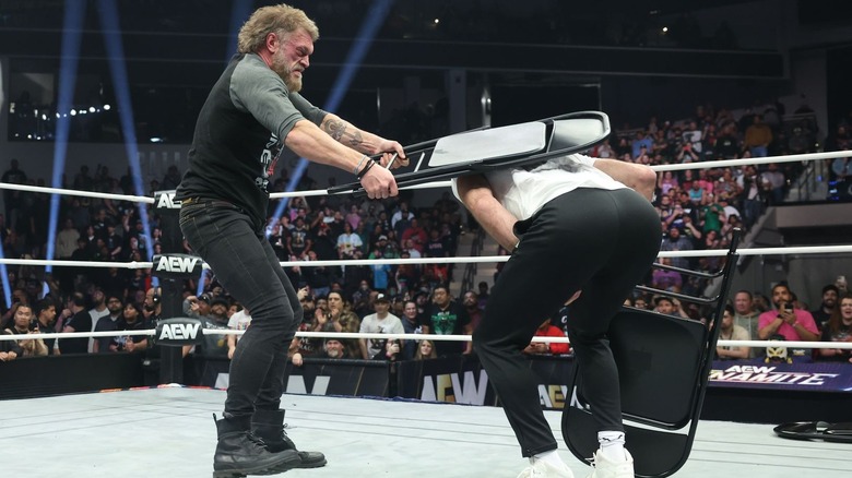 Cope delivers a chair shot to the back of Claudio Castagnoli in the ring on "AEW Dynamite."