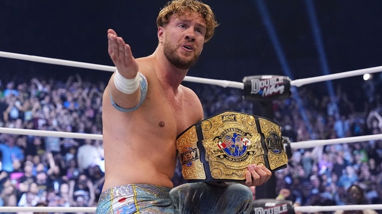 Will Ospreay posing with International title