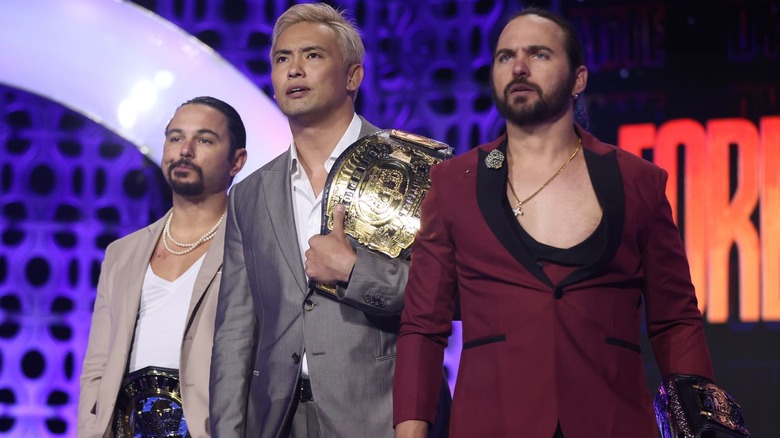 Kazuchika Okada with the Young Bucks