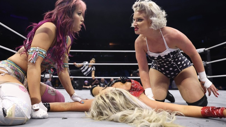 Mina Shirakawa and Toni Storm face off over Mariah May's fallen body