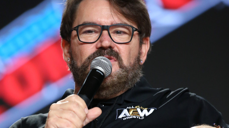 Tony Schiavone speaking into a microphone