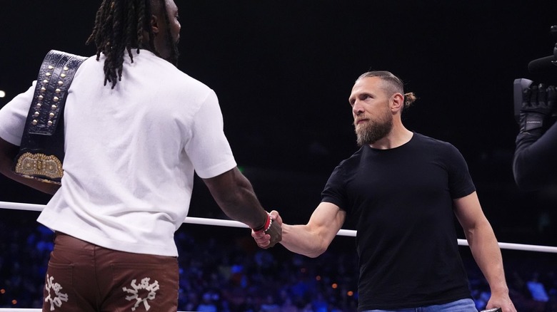 Swerve Strickland shaking hands with Bryan Danielson