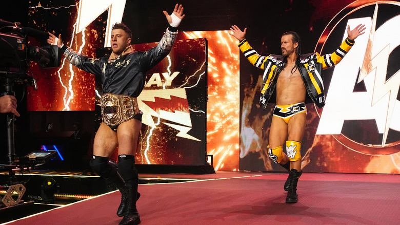 MJF walking down the ramp with Adam Cole