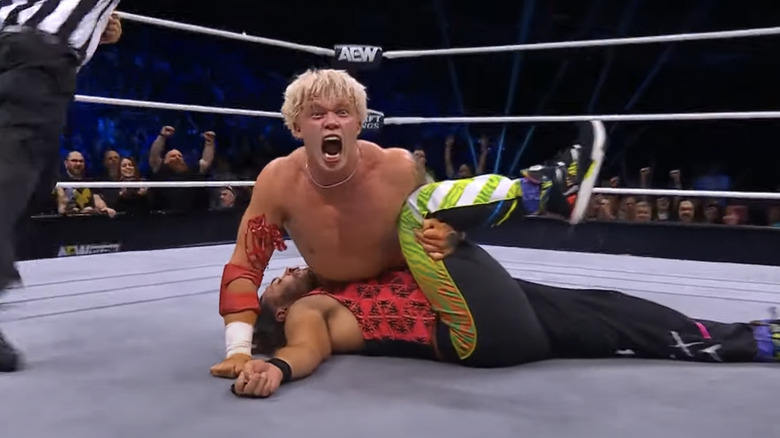 Kyle Fletcher screaming as he pins a Young Buck