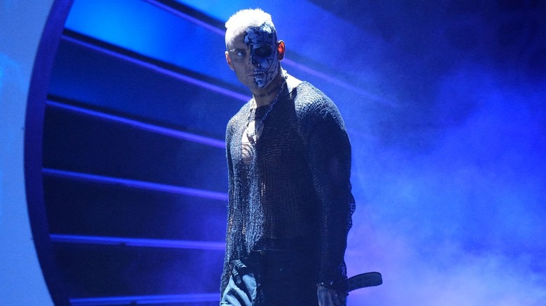 Darby Allin posing on his way to the ring
