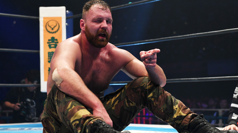 Jon Moxley sitting in the ring