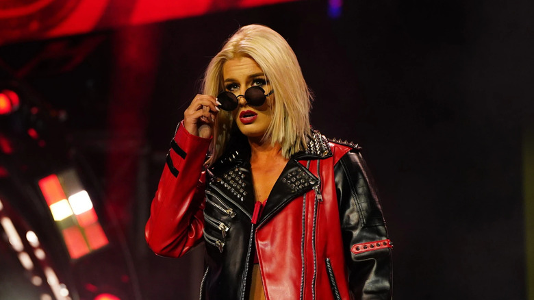 Toni Storm posing on her way to the ring