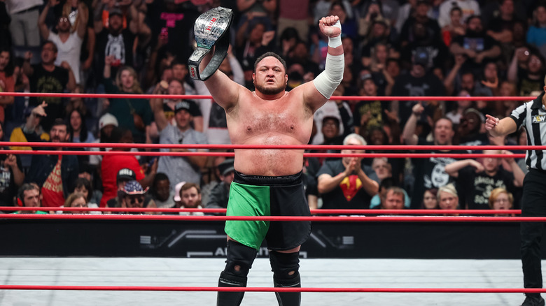 Samoa Joe poses with the ROH World Television title 