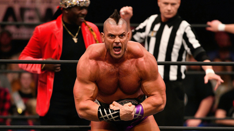 Brian Cage poses