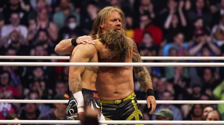 Chris Jericho hugs HOOK
