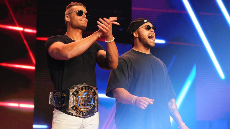 The Gunns posing with the AEW World Tag Team titles