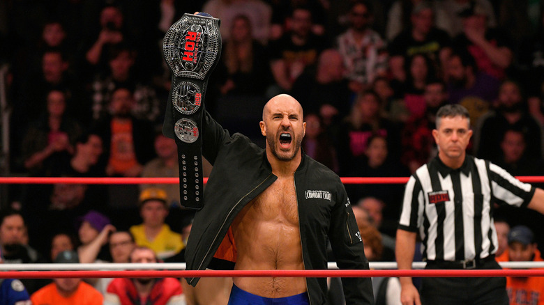 Claudio Castagnoli poses with the ROH World Title 