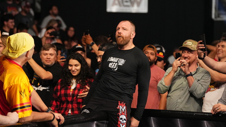 Jon Moxley getting in the ring 