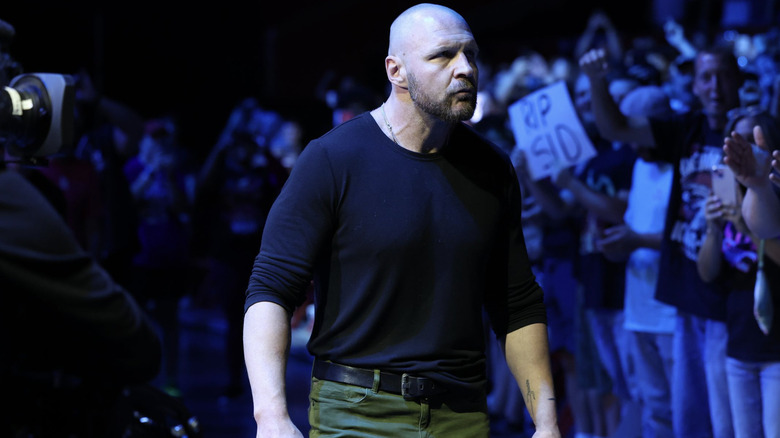 Moxley entering through the crowd