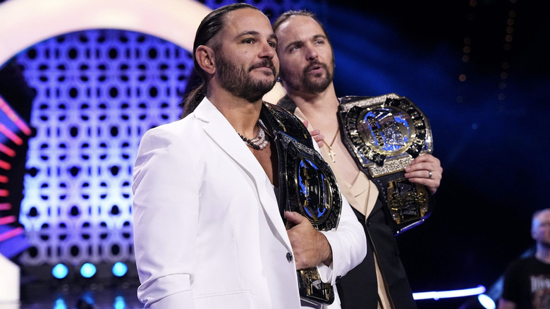 The Young Bucks on the entrance ramp with their AEW World Tag Team Championship belts