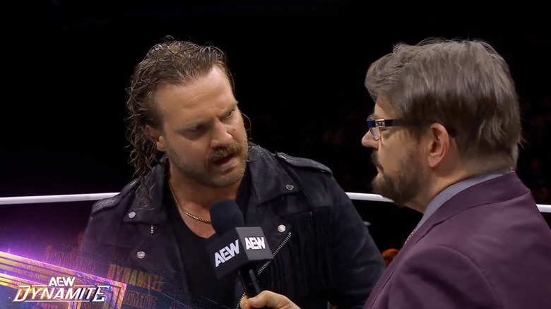 Page and Schiavone speaking in the ring