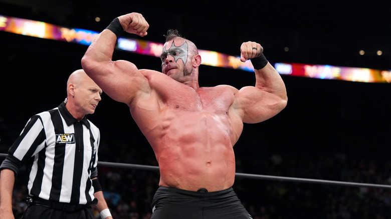Brian Cage flexing