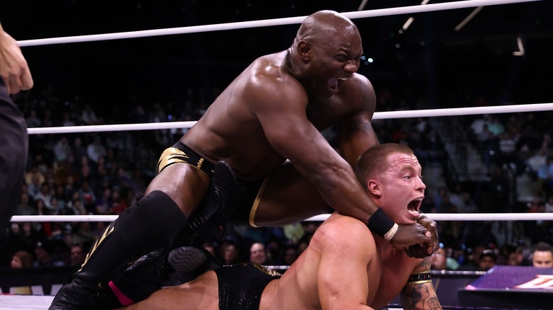 Shelton Benjamin and Kyle Fletcher wrestling on AEW Dynamite