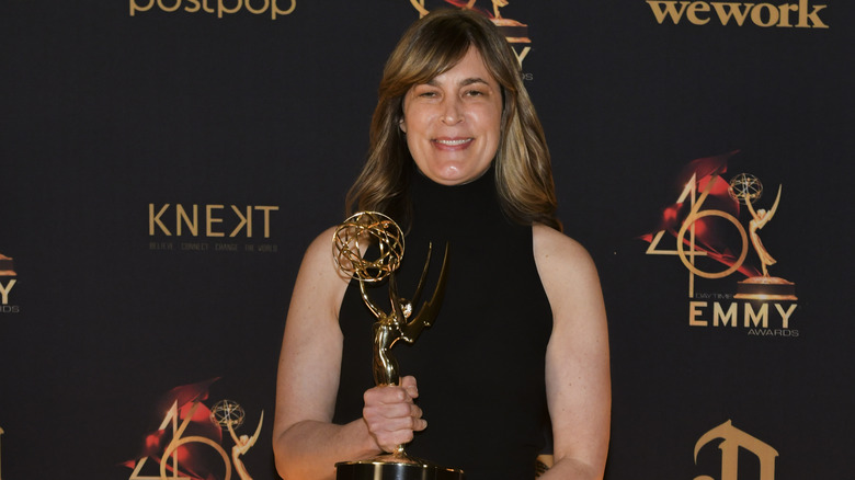 Jennifer Pepperman holding a Daytime Emmy Award