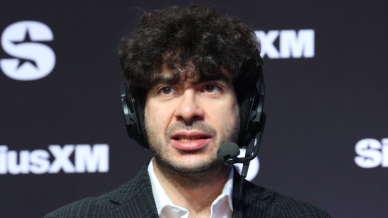 Tony Khan on a headset