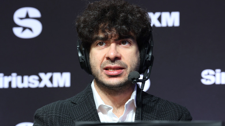 Tony Khan on a headset