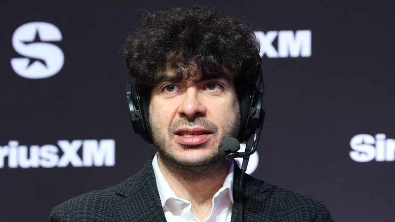 Tony Khan on a headset