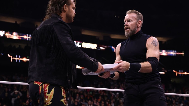 Hangman Adam Page and Christian Cage both hold onto a title match contract at AEW Full Gear.