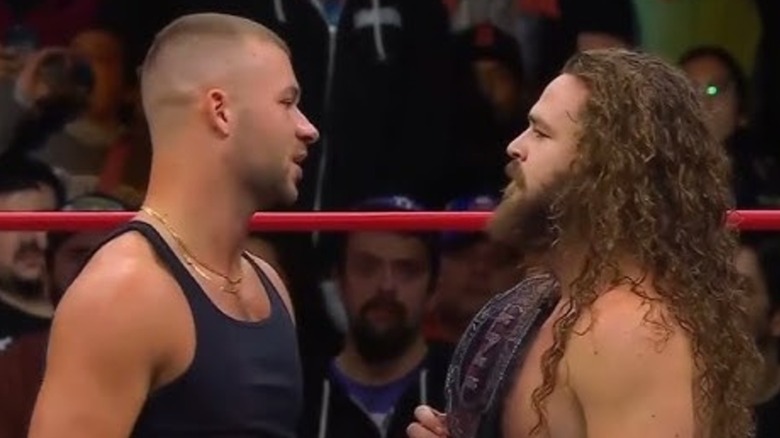 Daniel Garcia and AEW TNT Champion Jack Perry facing off in the ring