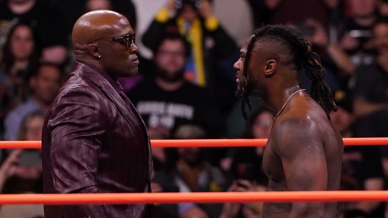 Bobby Lashley and Swerve Strickland staring at each other