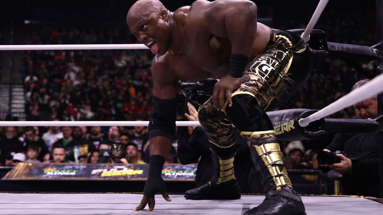 Bobby Lashley gets into a football stance at AEW Full Gear