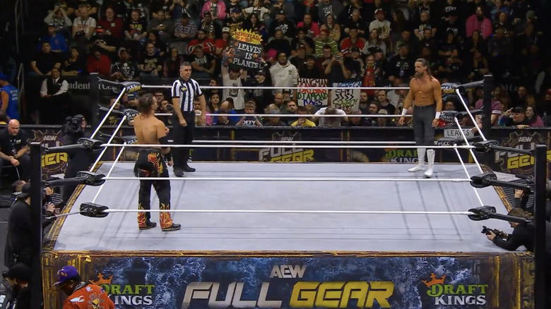 Page and White in the ring staring each other down