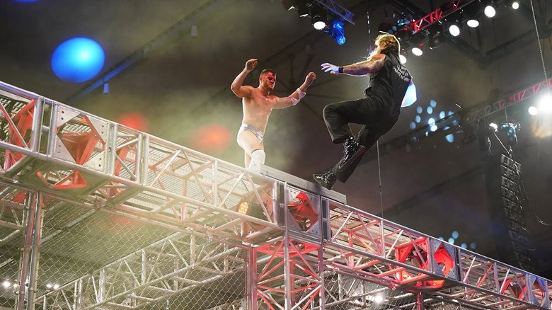 MJF Pushes Jericho Off Cage