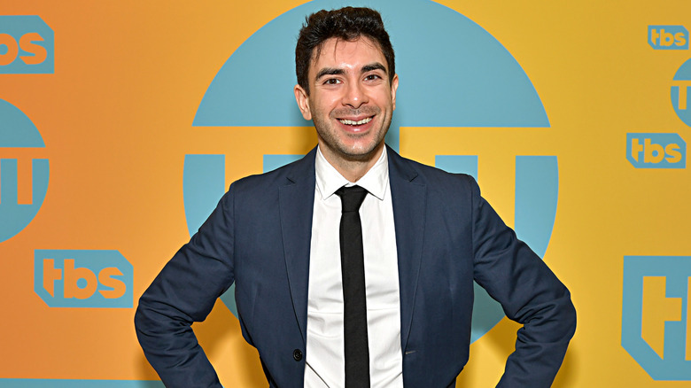 Tony Khan poses on the red carpet of a WarnerMedia event. 2019 TM & © Turner Entertainment Networks, Inc. A WarnerMedia Company