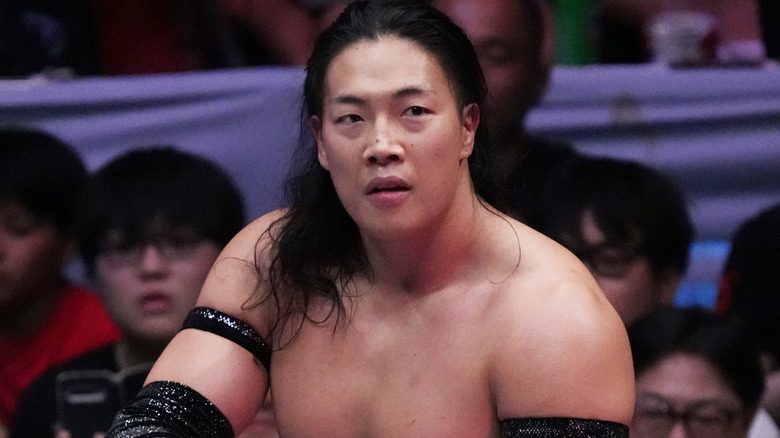 Konosuke Takeshita wearing a black armband