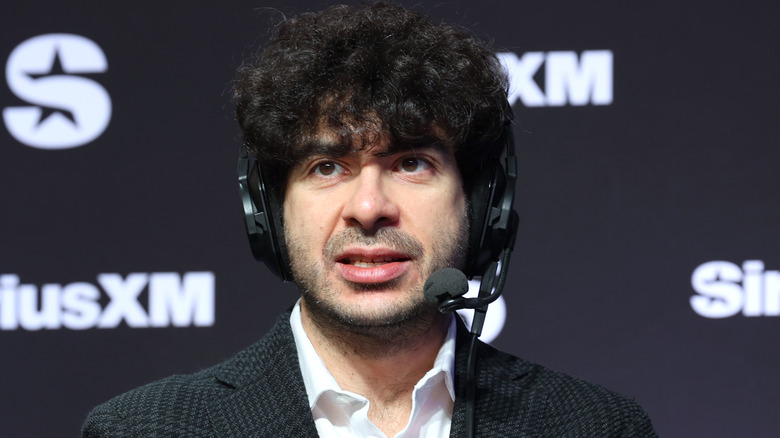 Tony Khan speaks on SiriusXM at Super Bowl LVIII on February 08, 2024 in Las Vegas, Nevada.