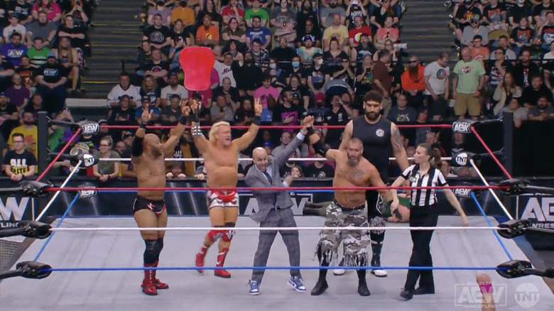 Mark Briscoe, Jay Lethal, Jeff Jarrett, Satnam Singh, and Sonjay Dutt  celebrating their win