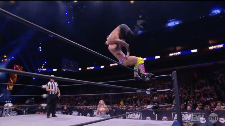 Guevara delivering a superplex to Allin