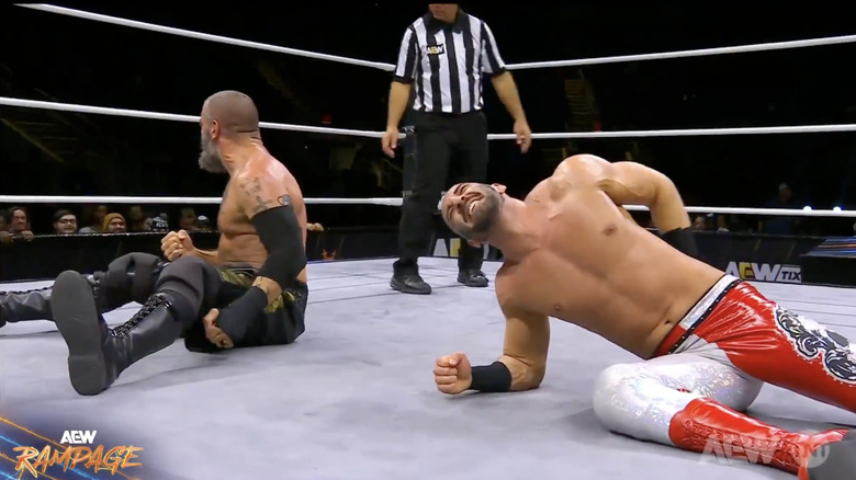 Briscoe and Daivari in the ring