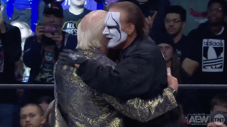 Sting and Flair hugging