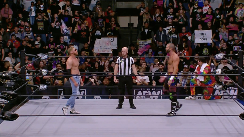 The two men facing off in the ring