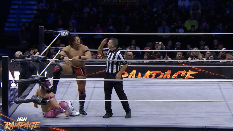 Takeshita and Komander in the ring